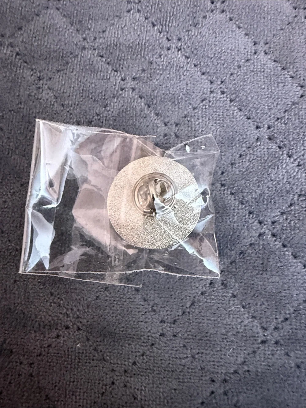 Omega branded lapel